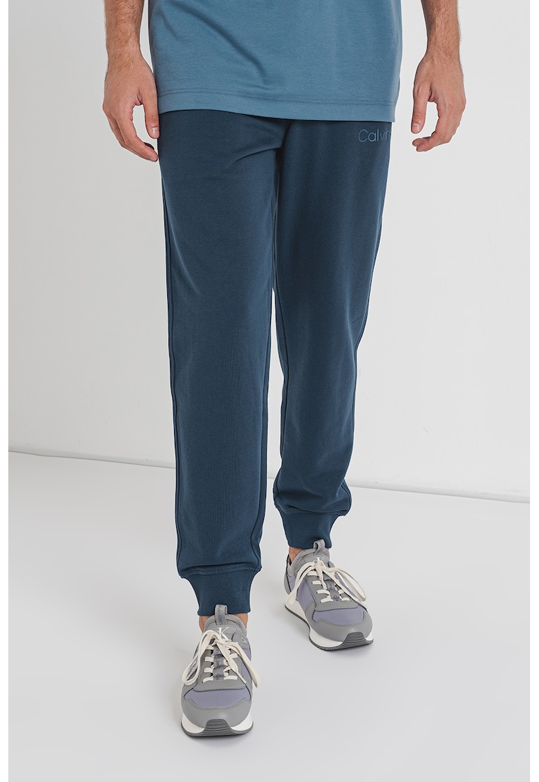 Стеснен панталон със средна талия CALVIN KLEIN JEANS