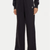 Champion Долнище анцуг 117661 Черен Wide Leg за Жени цена