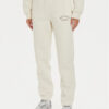 New Balance Долнище анцуг WP43500 Бежов Relaxed Fit за Жени цена