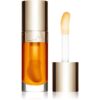 Clarins Lip Comfort Oil масло от нар с хидратиращ ефект цвят 01 honey 7 мл.