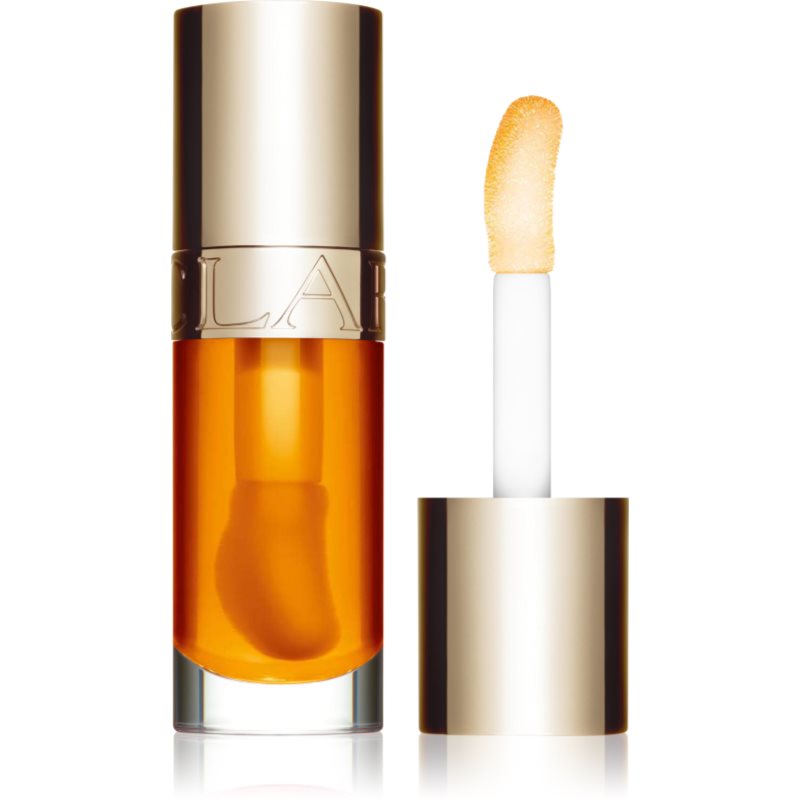 Clarins Lip Comfort Oil масло от нар с хидратиращ ефект цвят 01 honey 7 мл.
