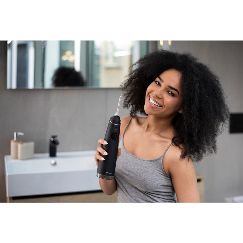 TrueLife AquaFloss Compact C300 White душ за устна хигиена 1 бр. на ниска цена