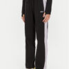 Ellesse Долнище анцуг Schmitten SGX20913 Черен Regular Fit за Жени цена