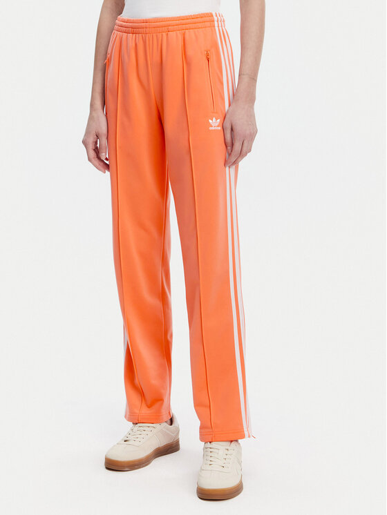 adidas Долнище анцуг adicolor Classics Firebird JC8286 Оранжев Regular Fit за Жени цена