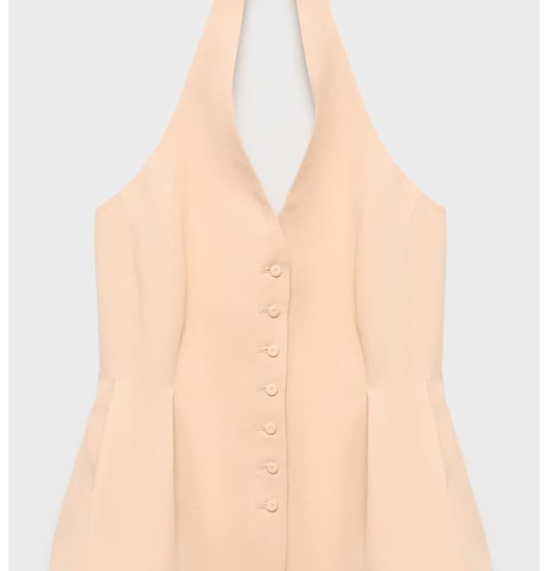 Елек с копчета и плисиран детайл Mango