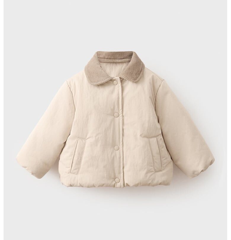 Капитонирано яке с контрастна яка Mango