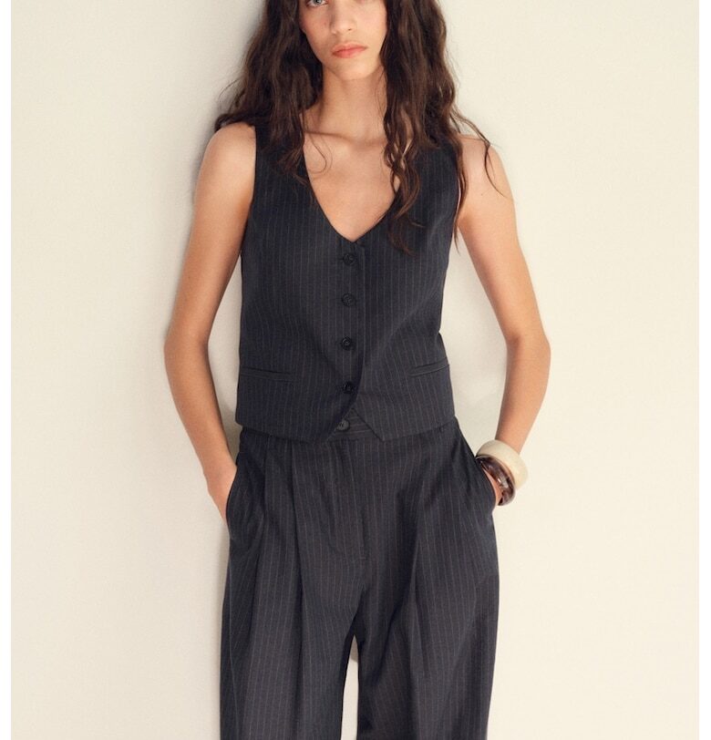 Къс елек с лен и обшити джобове Mango