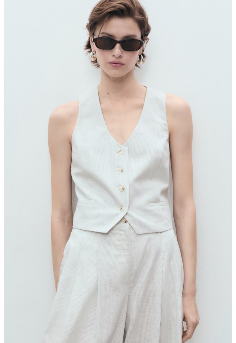 Къс елек с лен и обшити джобове Mango