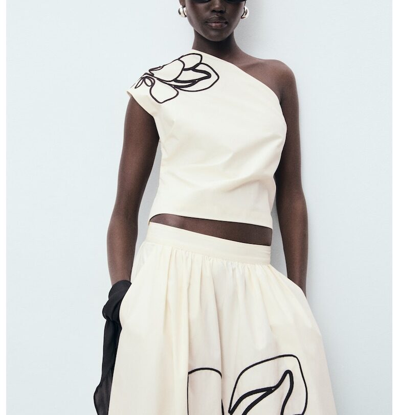 Къса блуза с едно рамо и бродерия Mango