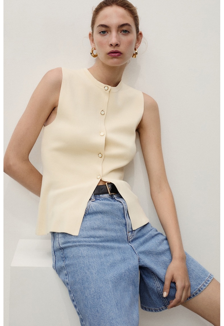 Къси свободни дънки със средновисока талия Mango