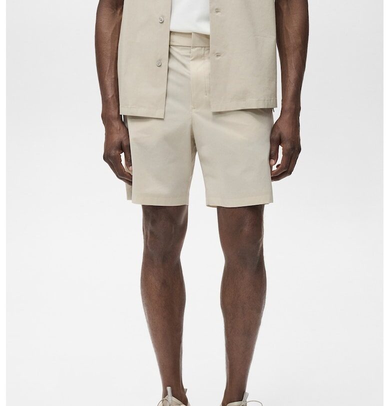 Непромокаем къс панталон с джобове с цип Mango