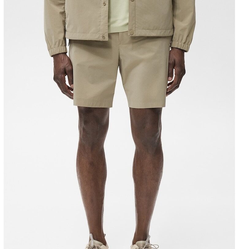 Непромокаем къс панталон с джобове с цип Mango