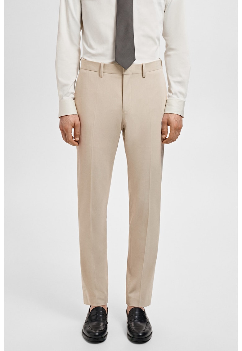 Панталон със стеснен крачол и джобове Mango