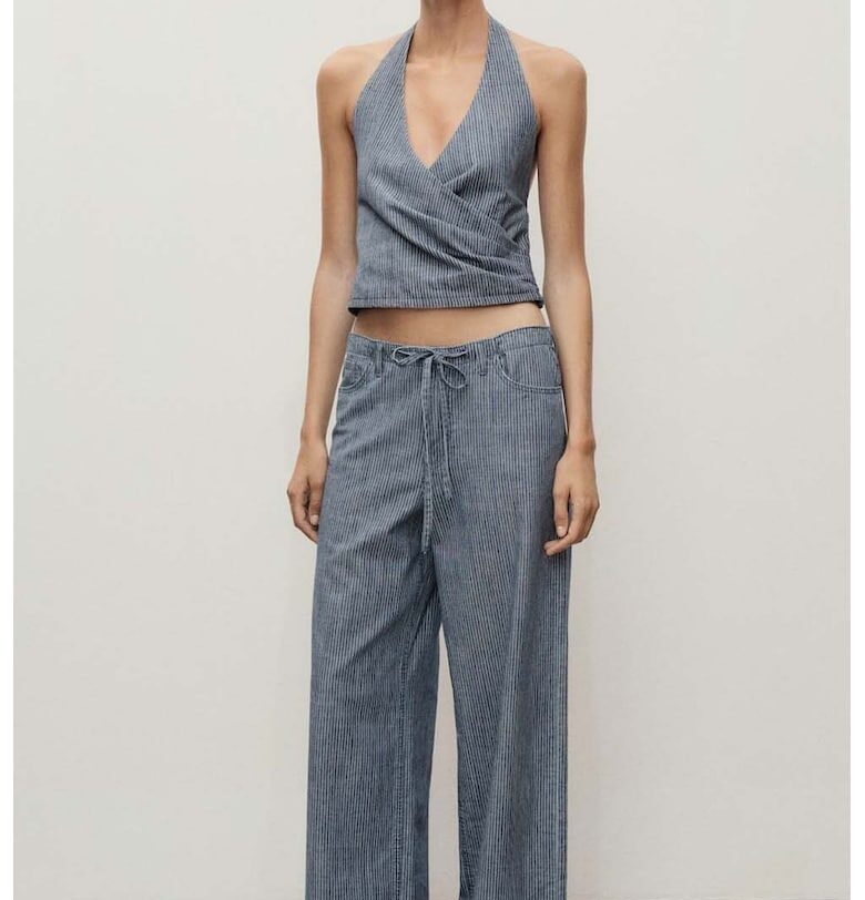 Раирани разкроени дънки с връзка Mango