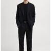 Скосен панталон с басти Mango