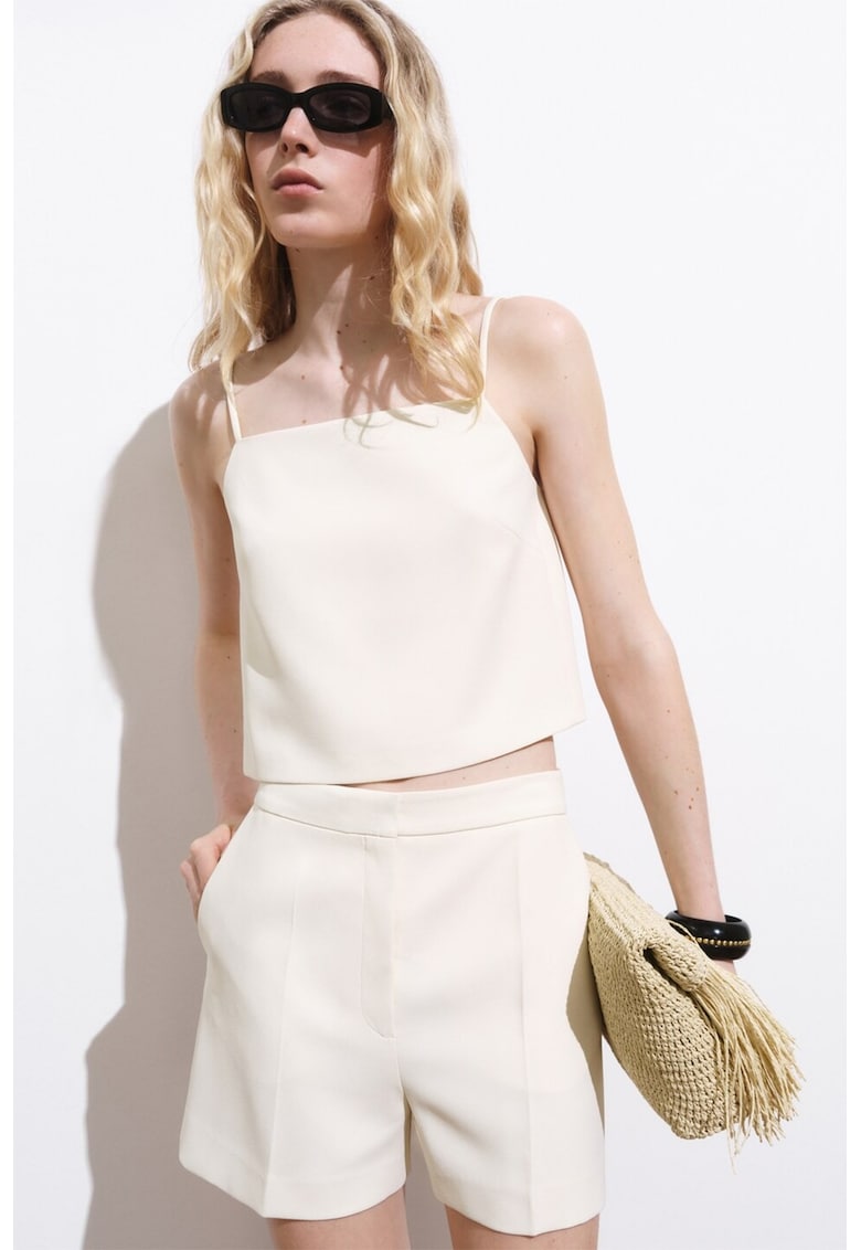 Топ с копчета на гърба Mango