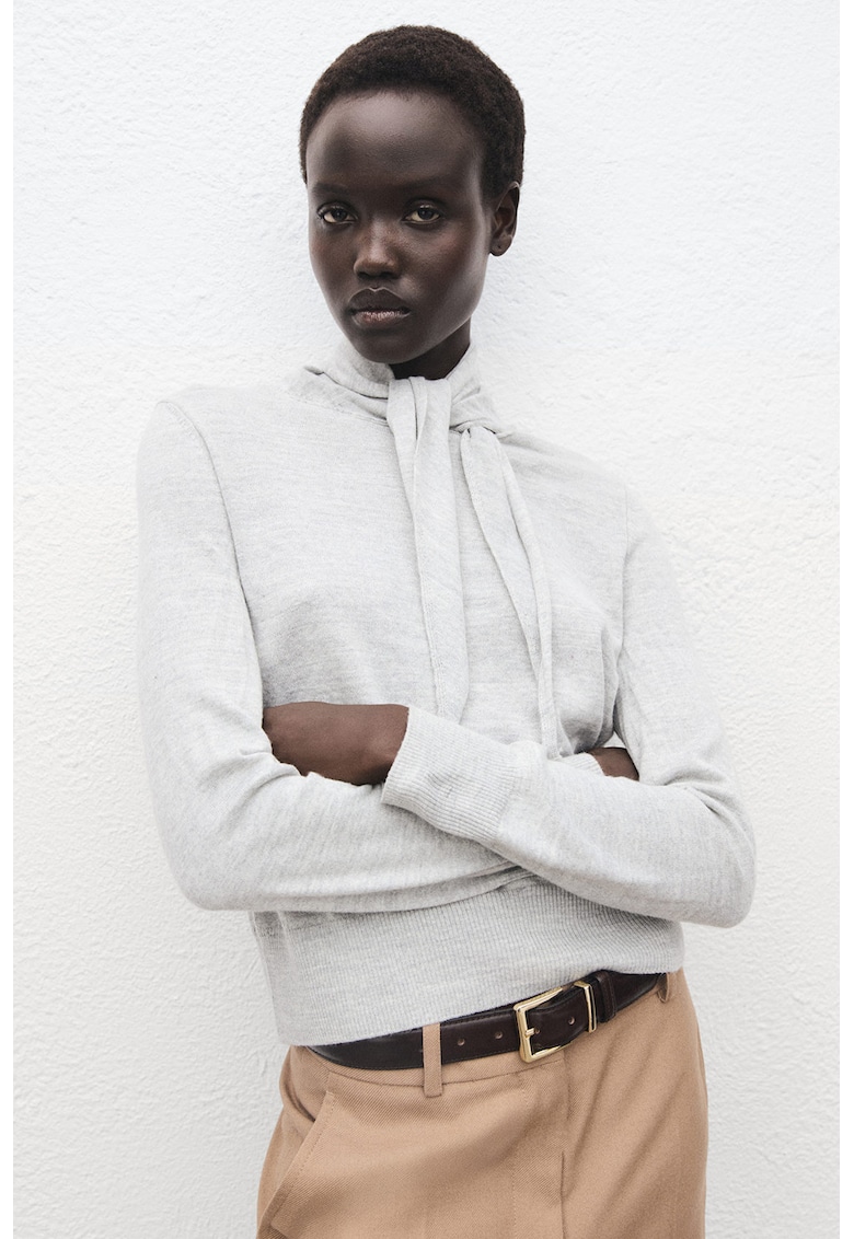 Пуловер с вълна и висока яка с връзки Mango