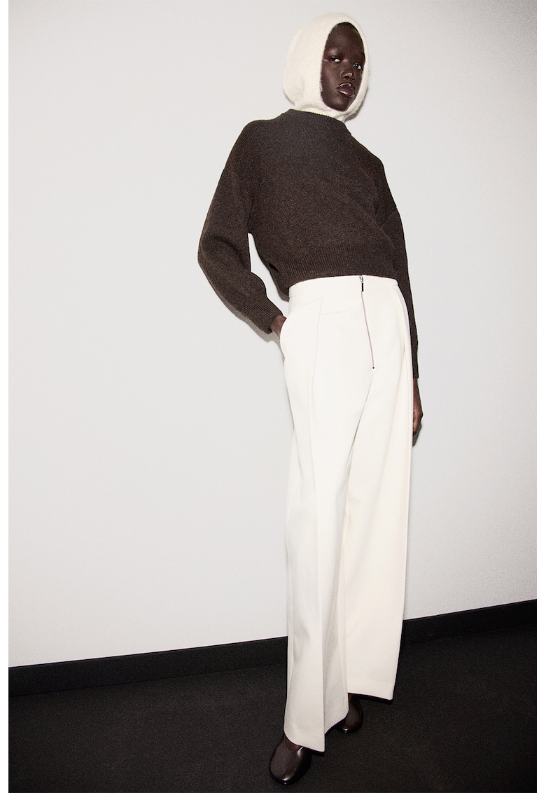 Свободен пуловер с вълна Mango