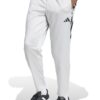 Спортен панталон с джобове и лого adidas Sportswear