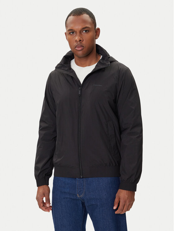 Calvin Klein Преходно яке LV04LC511G Черен Relaxed Fit цвят на ниска цена