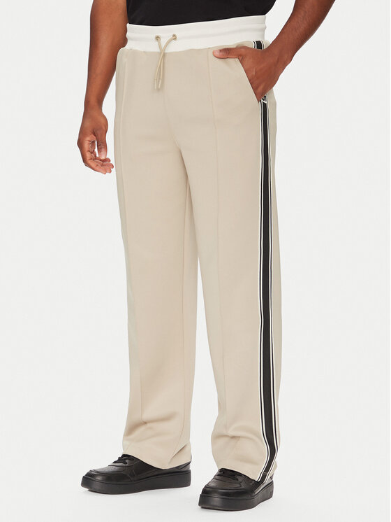 Guess Долнище анцуг Z5YB14 KCRU2 Бежов Regular Fit цвят на ниска цена