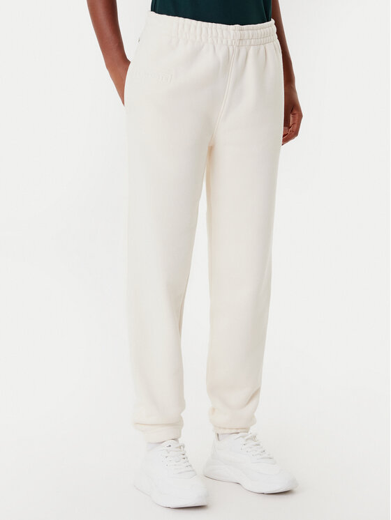 Lacoste Долнище анцуг XF0353 Бежов Regular Fit цвят на ниска цена