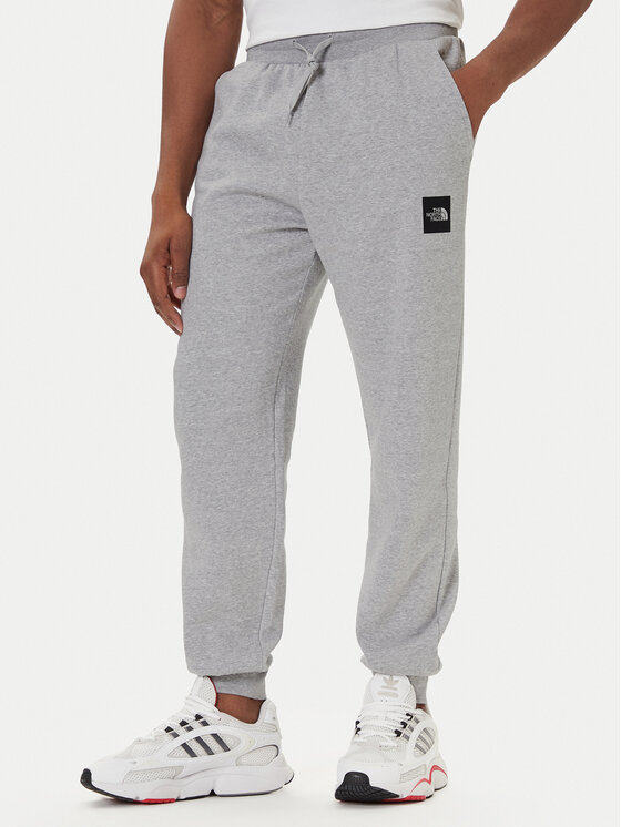 The North Face Долнище анцуг Fine NF0A8C1K Сив Tapered Fit цвят на ниска цена