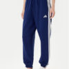 adidas Долнище анцуг Essentials 3-Stripes Fleece JX7696 Син Loose Fit цвят на ниска цена