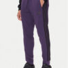 adidas Долнище анцуг Essentials 3-Stripes JX0750 Виолетов Regular Fit цвят на ниска цена