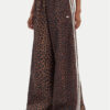 adidas Долнище анцуг Leopard Firebird JW7302 Кафяв Wide Leg цвят на ниска цена