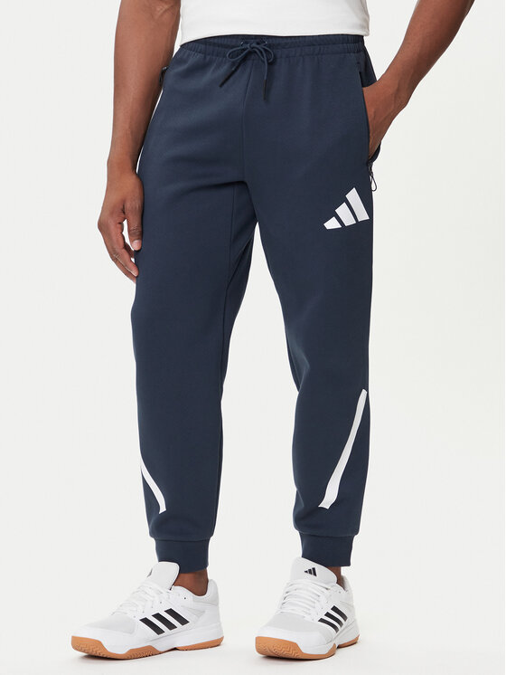 adidas Долнище анцуг Z.N.E. JW4723 Тъмносин Loose Fit цвят на ниска цена