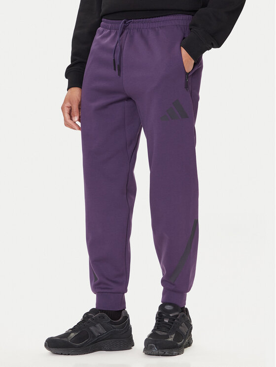 adidas Долнище анцуг Z.N.E. JW4726 Виолетов Loose Fit цвят на ниска цена