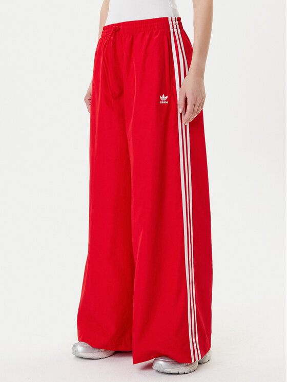 adidas Долнище анцуг adicolor Firebird JD3388 Червен Loose Fit цвят на ниска цена