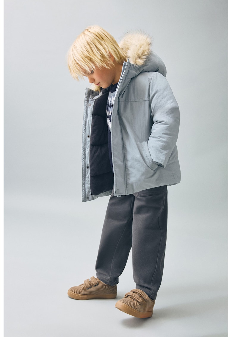 Зимна парка с джобове встрани Mango