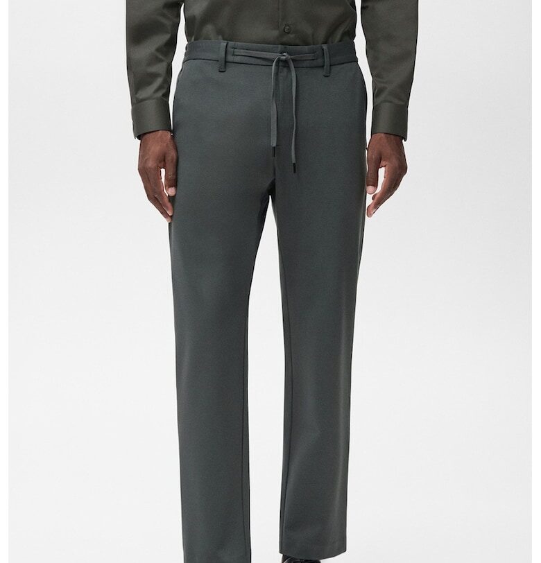 Едноцветен панталон с връзка Mango