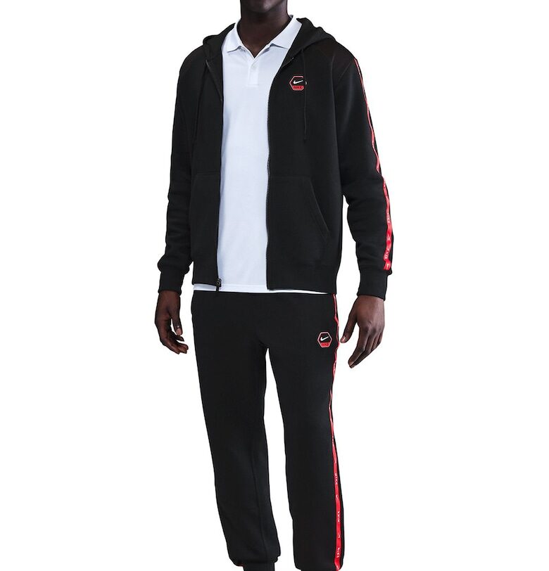 Скосен спортен панталон с миди талия Nike