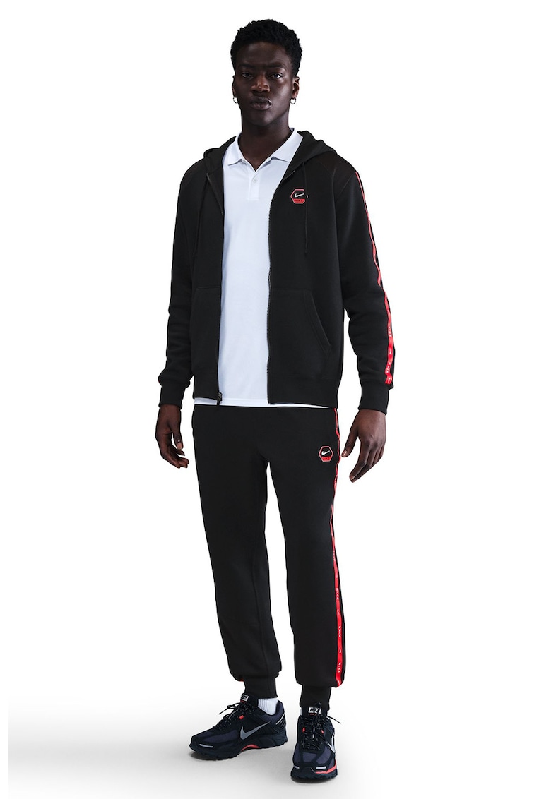 Скосен спортен панталон с миди талия Nike