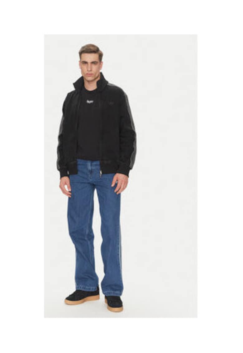 Дънки свободна кройка със средна талия adidas