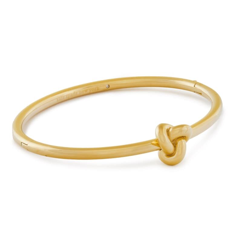 Гривна за дама -  златиста - от пластмасов материал - универсална KATE SPADE