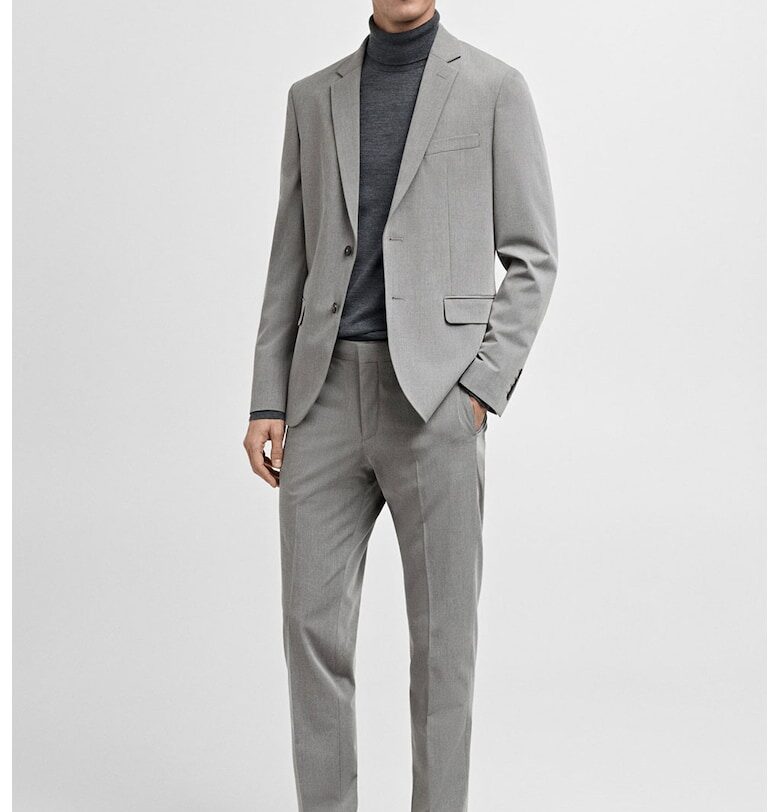 Скосен панталон със странични джобове Mango